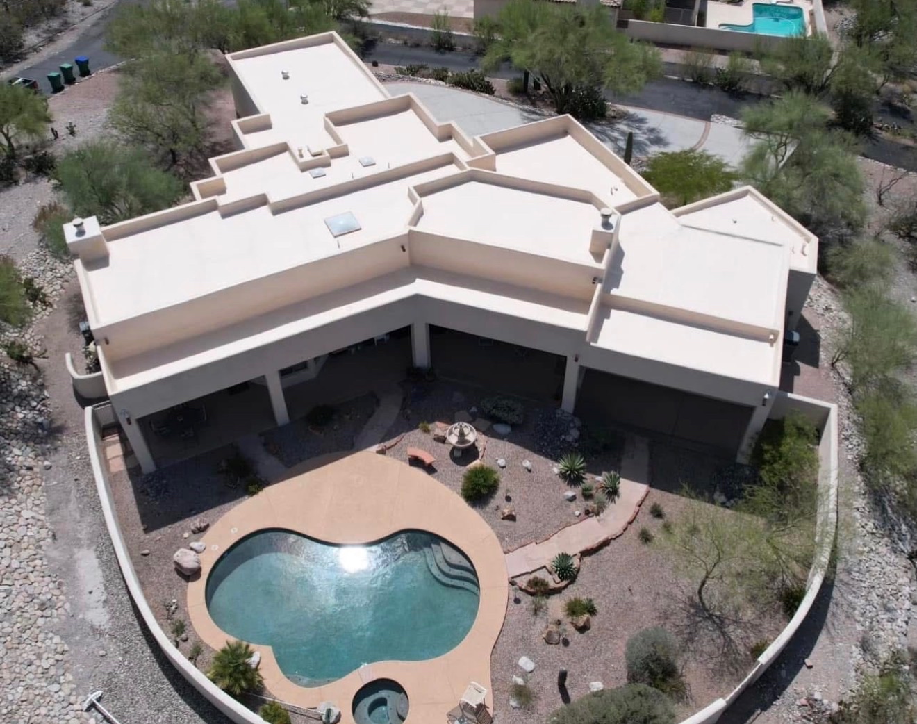 Completed W&D Roofing reflective cool roof coating system on an Arizona flat roof