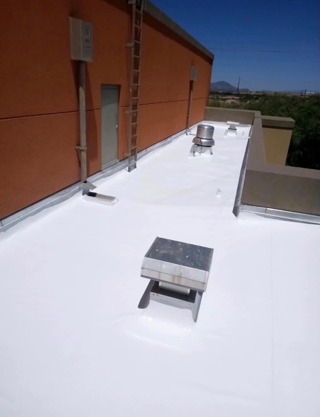 Finished fire station flat roof coating in Rio Rico by W&D Roofing