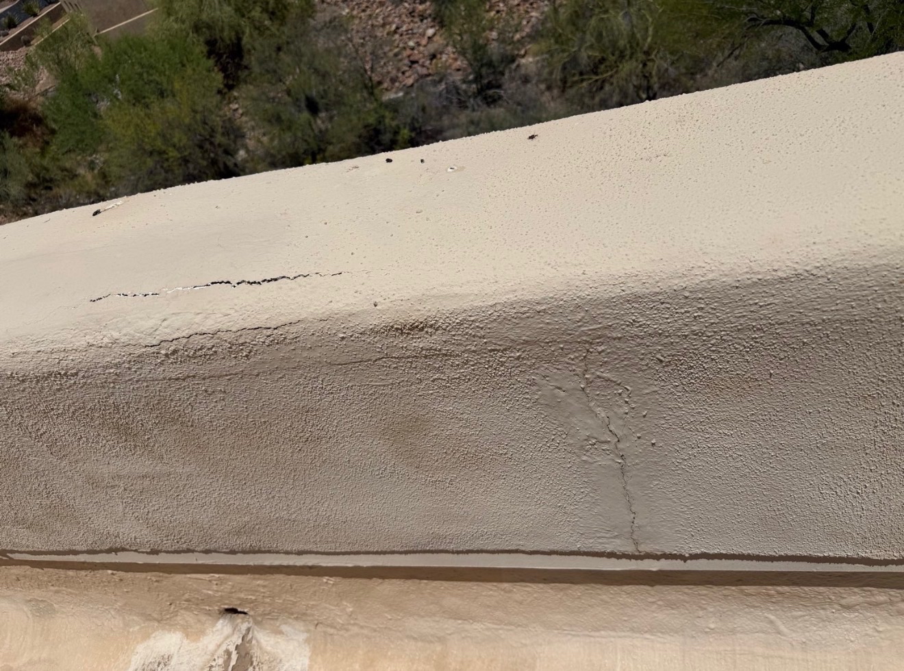 Before W&D Roofing roof coating restoration showing surface wear and roof preparation needs