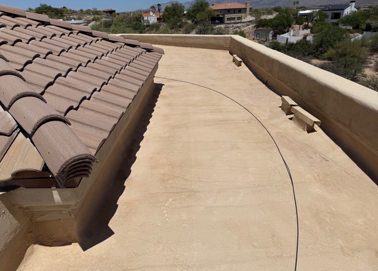 Flat roof before W&D Roofing restoration and TRC-990 roof coating