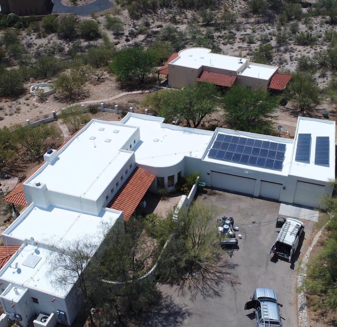 Finished W&D silicone roof coating project with reflective waterproof roof surface