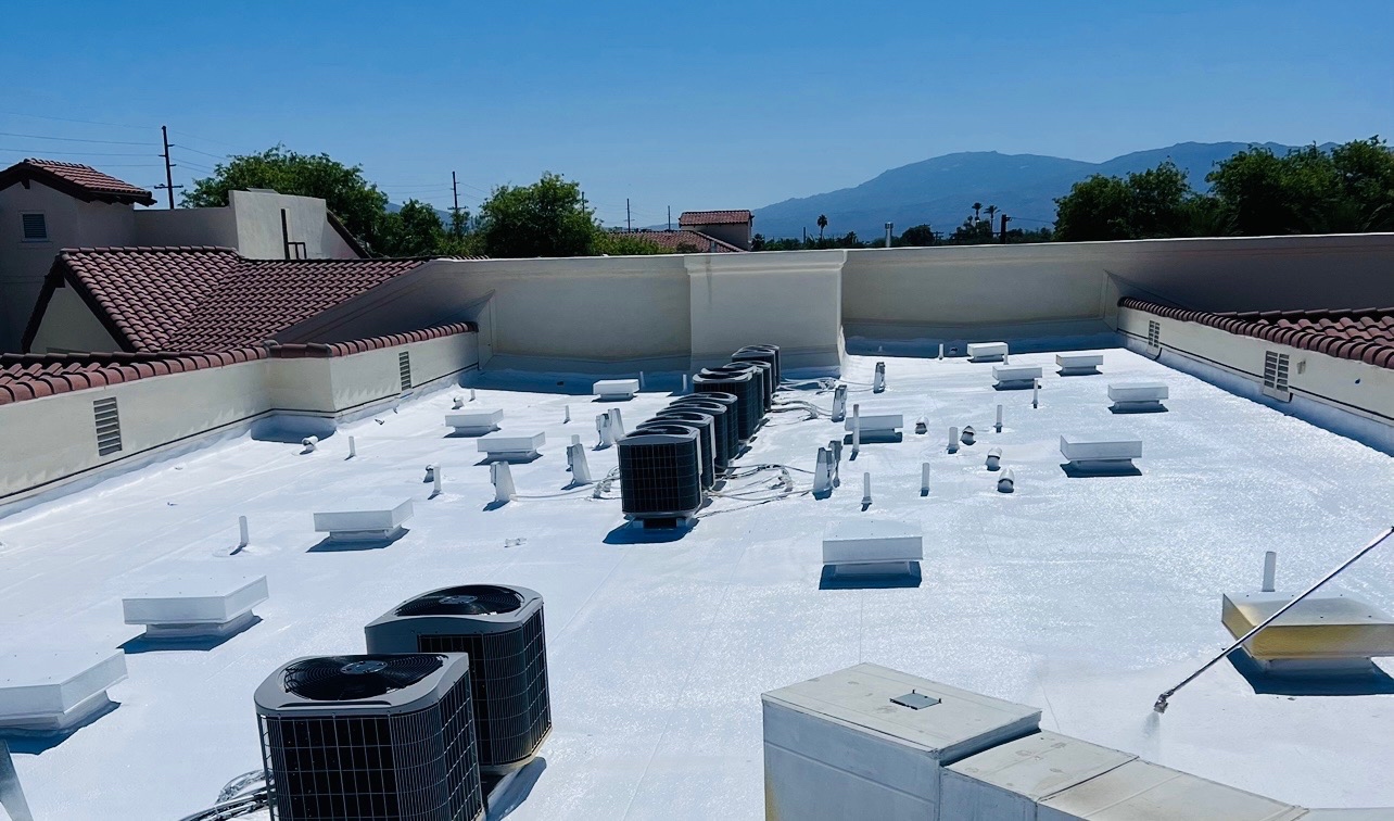 Completed reflective commercial roof coating project by W&D Roofing