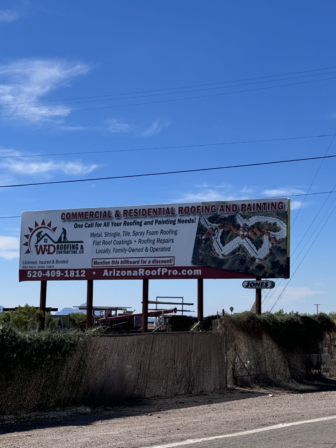 W&D Roofing & Contracting billboard and Arizona contractor branding