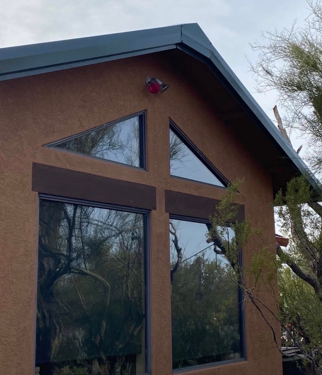 Metal roof trim and fascia detail on completed W&D Roofing project