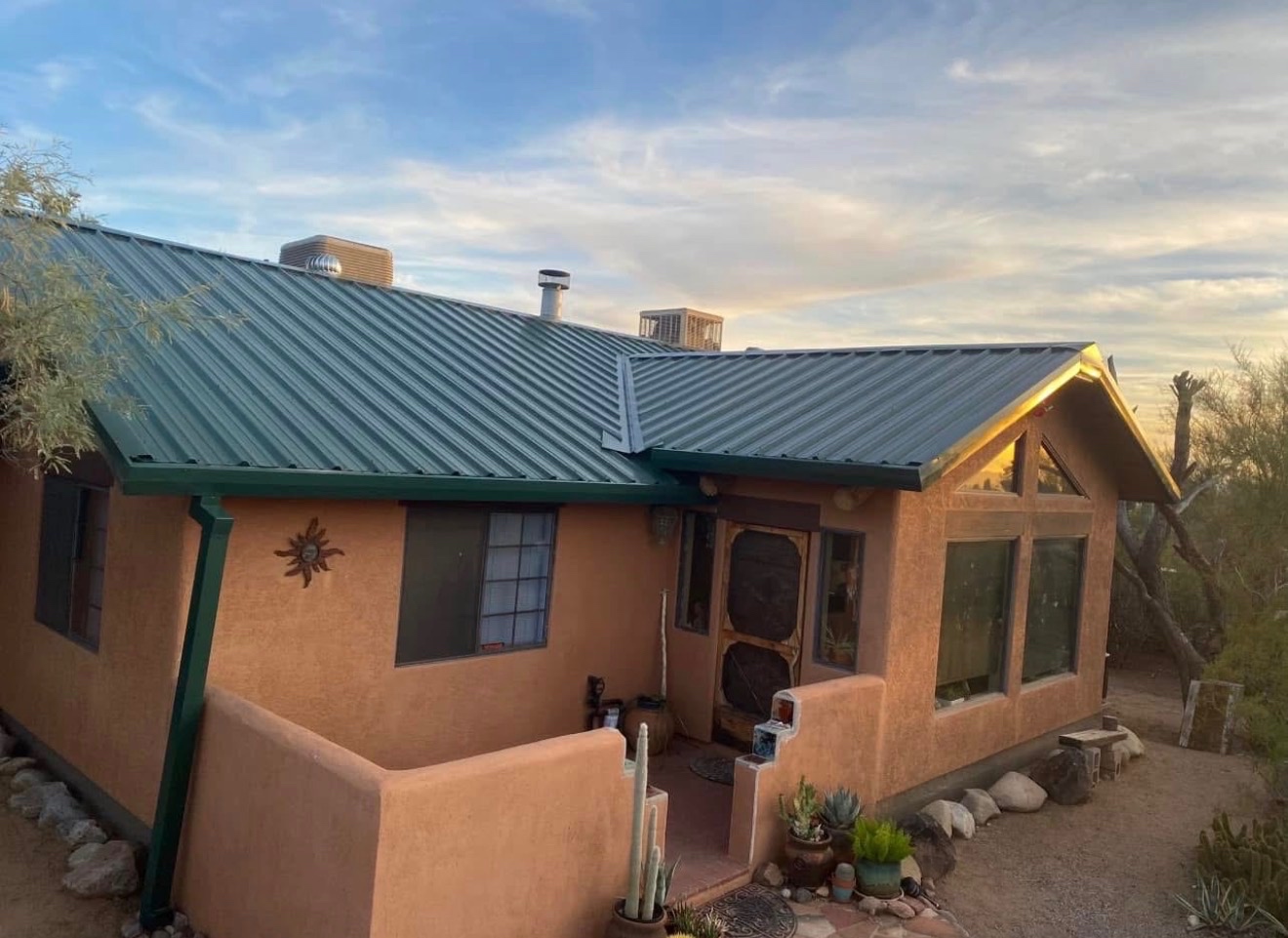 Real W&D Roofing standing seam metal roof installation on an Arizona home