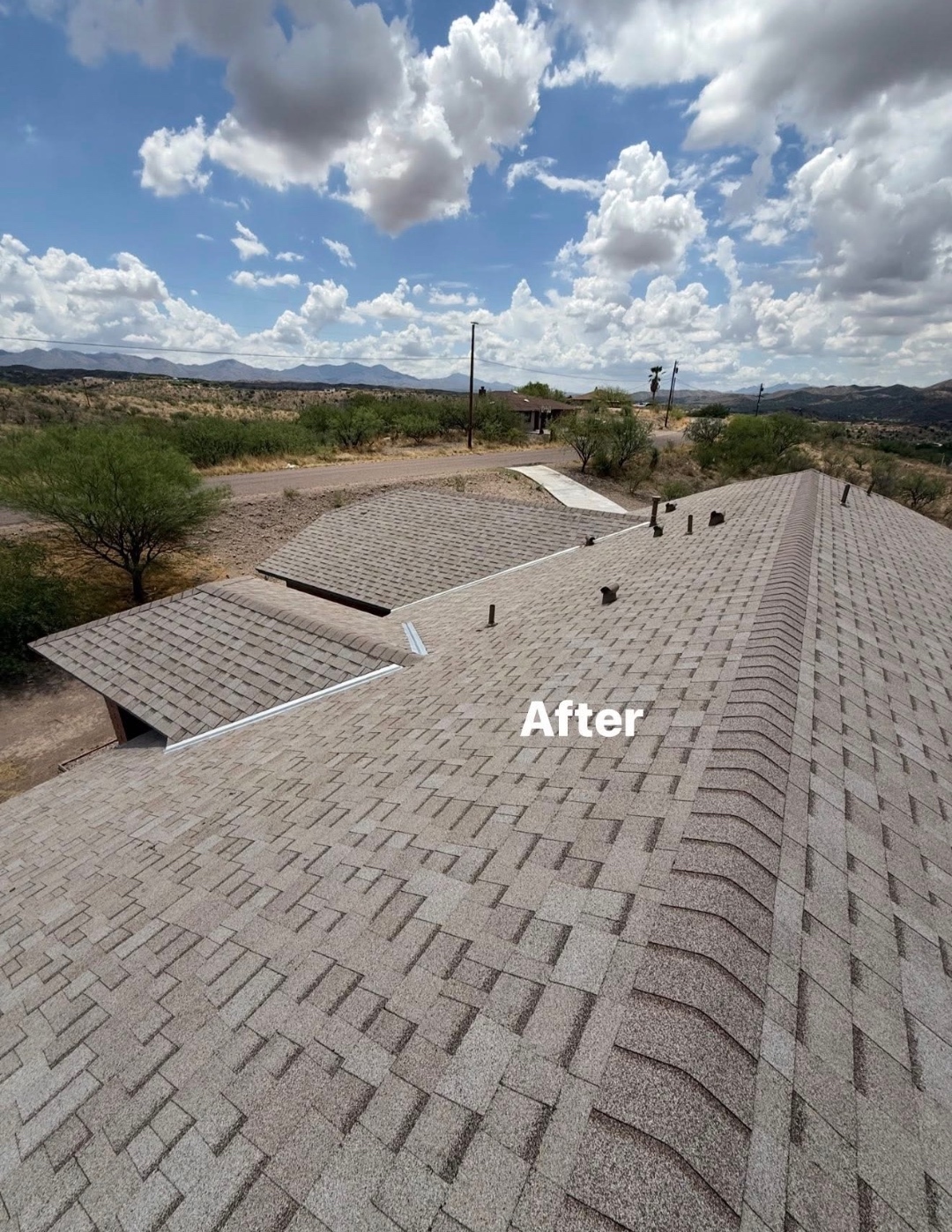 Completed W&D Roofing modern shingle roof system on an Arizona home