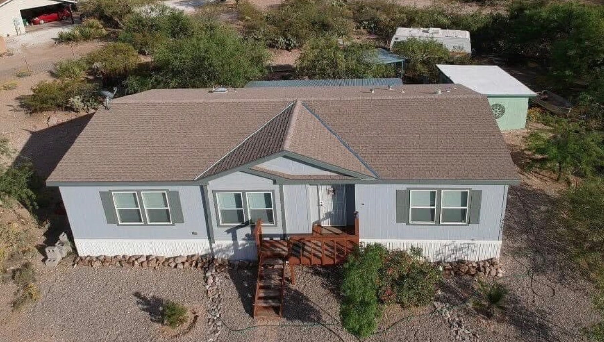 Real W&D Roofing residential shingle roof replacement on an Arizona home