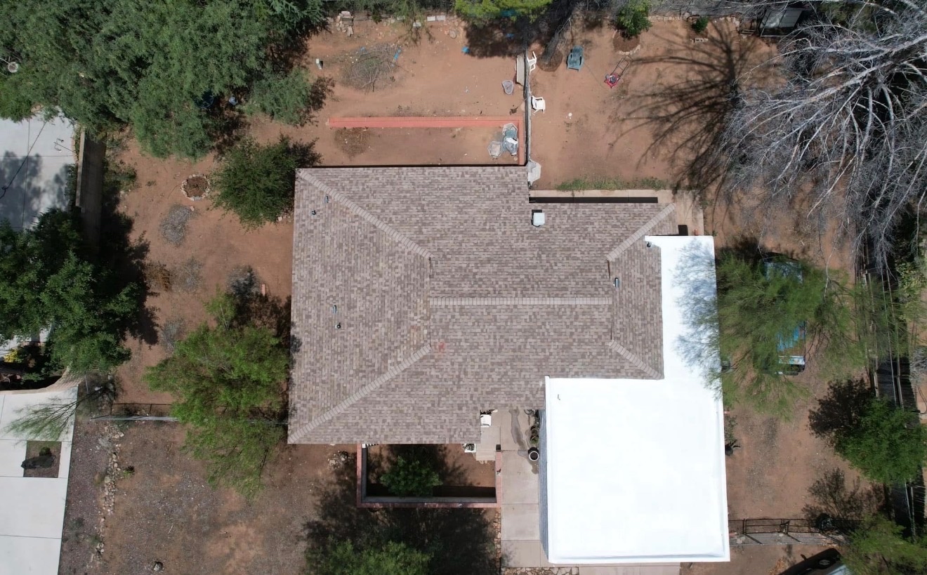 Completed W&D Roofing architectural shingle roof replacement with clean finished roof lines