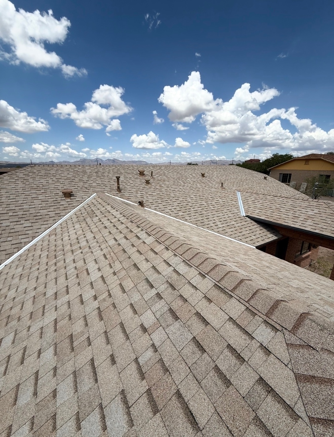 Completed W&D Roofing shingle roof replacement from a full project sequence