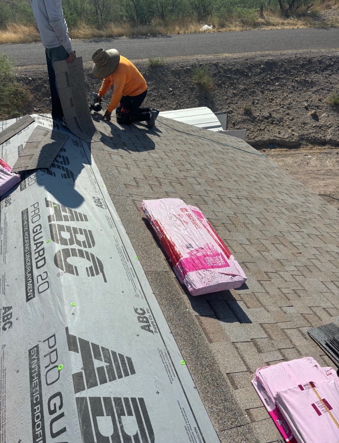 W&D Roofing underlayment preparation during a residential shingle roof replacement