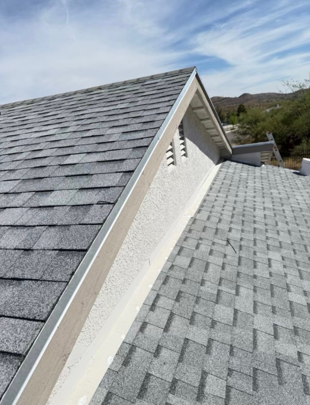 Completed W&D Roofing architectural shingle roof replacement detail view