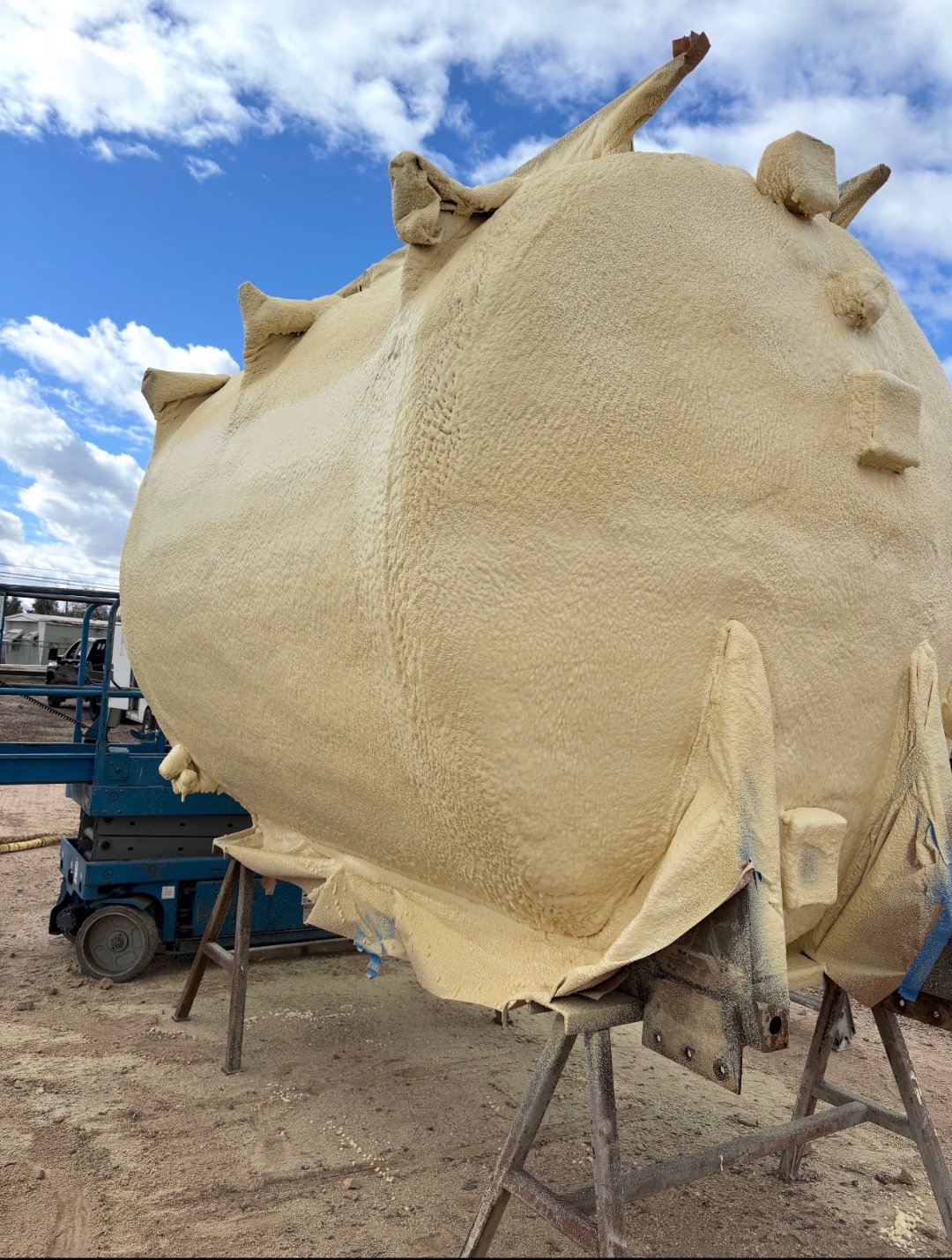 Industrial tank after W&D spray foam insulation and protective application