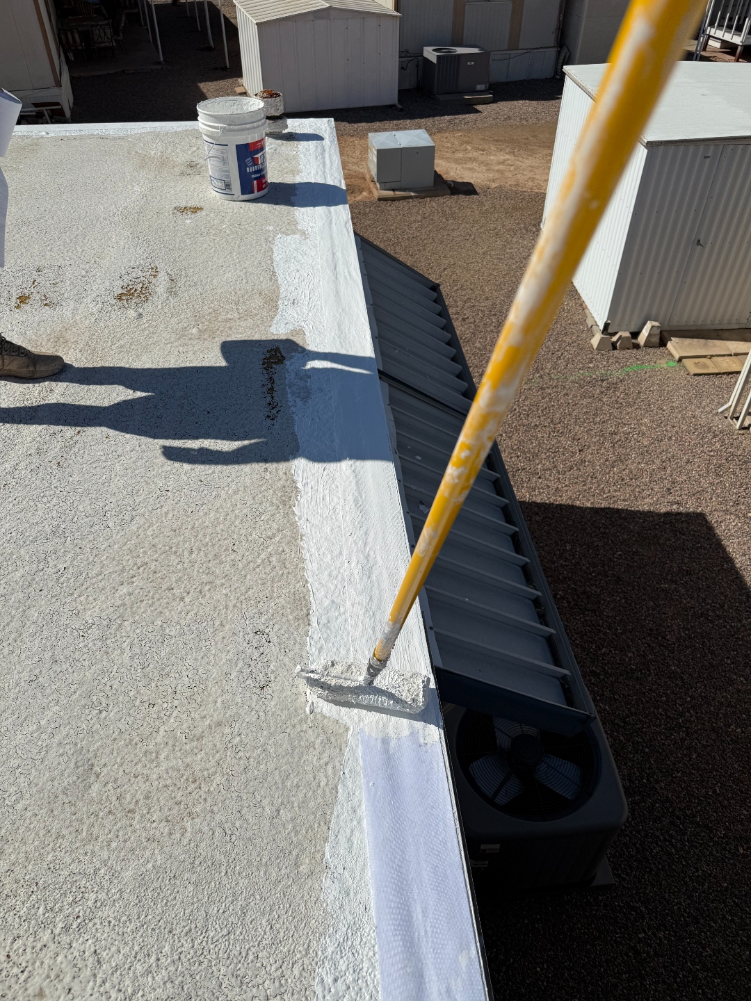 W&D Roofing mobile home foam roof repair detail work along the roof edge