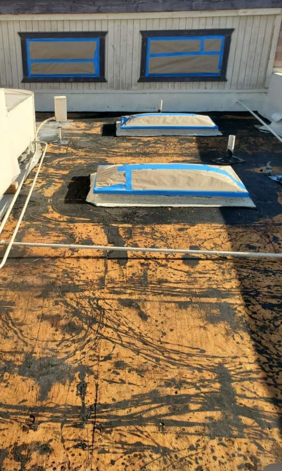 W&D Roofing spray foam roof prep before application on an Arizona flat roof