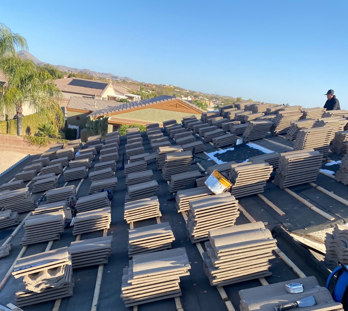 W&D Roofing stacked tile materials on an Arizona tile roof replacement project