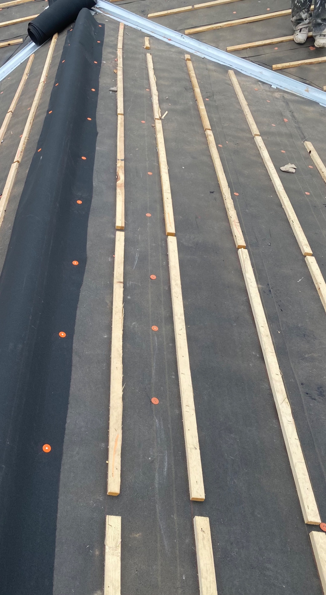 W&D Roofing tile roof underlayment and batten detail during roof replacement